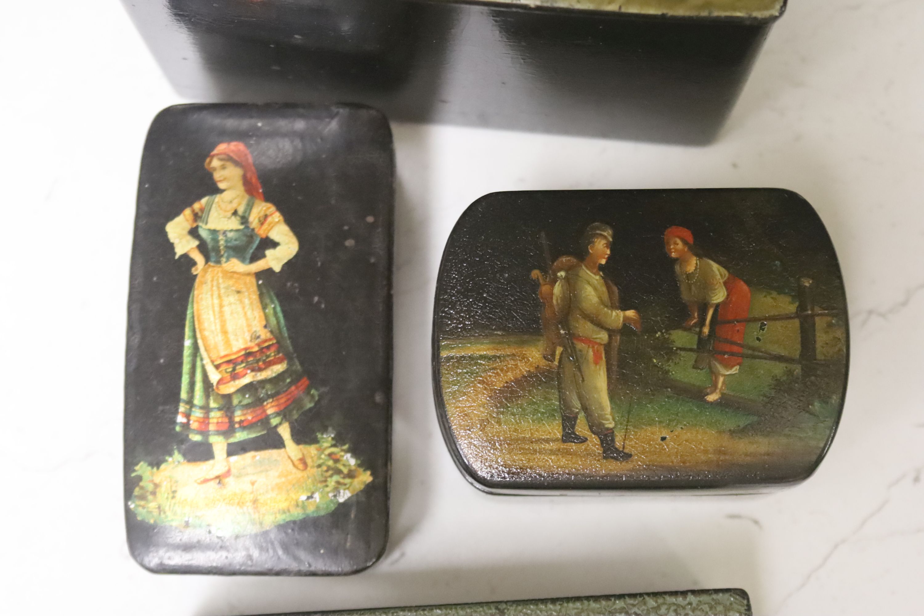 A collection of six Russian and European lacquer boxes, largest 14 x 9cm 9cm high, together with a papier mache snuff box and another decorative box (8)